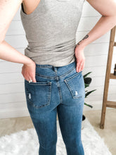 Load image into Gallery viewer, Medium Wash High Rise Distressed Hem Skinny Jean
