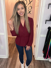 Load image into Gallery viewer, Garnet Surplice Peplum Long Sleeve Top
