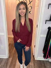 Load image into Gallery viewer, Garnet Surplice Peplum Long Sleeve Top
