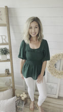 Load and play video in Gallery viewer, Hunter Green Smocked Peplum Top
