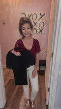 Load and play video in Gallery viewer, Black Mesh Ruffled Sleeve Ribbed V Neck Top
