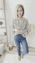 Load and play video in Gallery viewer, Ruffled Dalmatian Print Top
