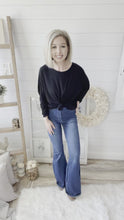 Load and play video in Gallery viewer, Medium Wash Flare High Rise Jeans
