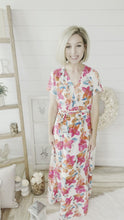 Load and play video in Gallery viewer, Floral Print Wrap Maxi Dress
