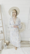 Load and play video in Gallery viewer, V-Neck Floral Print Ruffled Midi Dress
