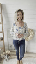 Load and play video in Gallery viewer, Blue Ivory Floral Tiered Long Sleeve Top
