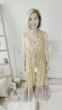 Load and play video in Gallery viewer, Yellow Floral Midi Tassel Front Slit Dress

